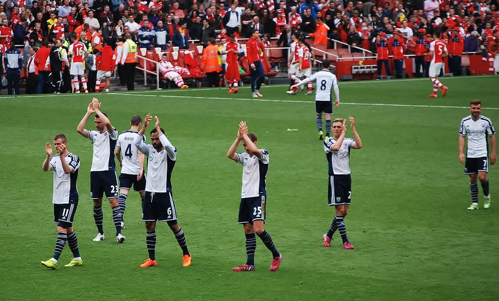 West Bromwich Albion players applauding the magnificent traveling Baggies fans at the end of the season match at the Emirates Stadium